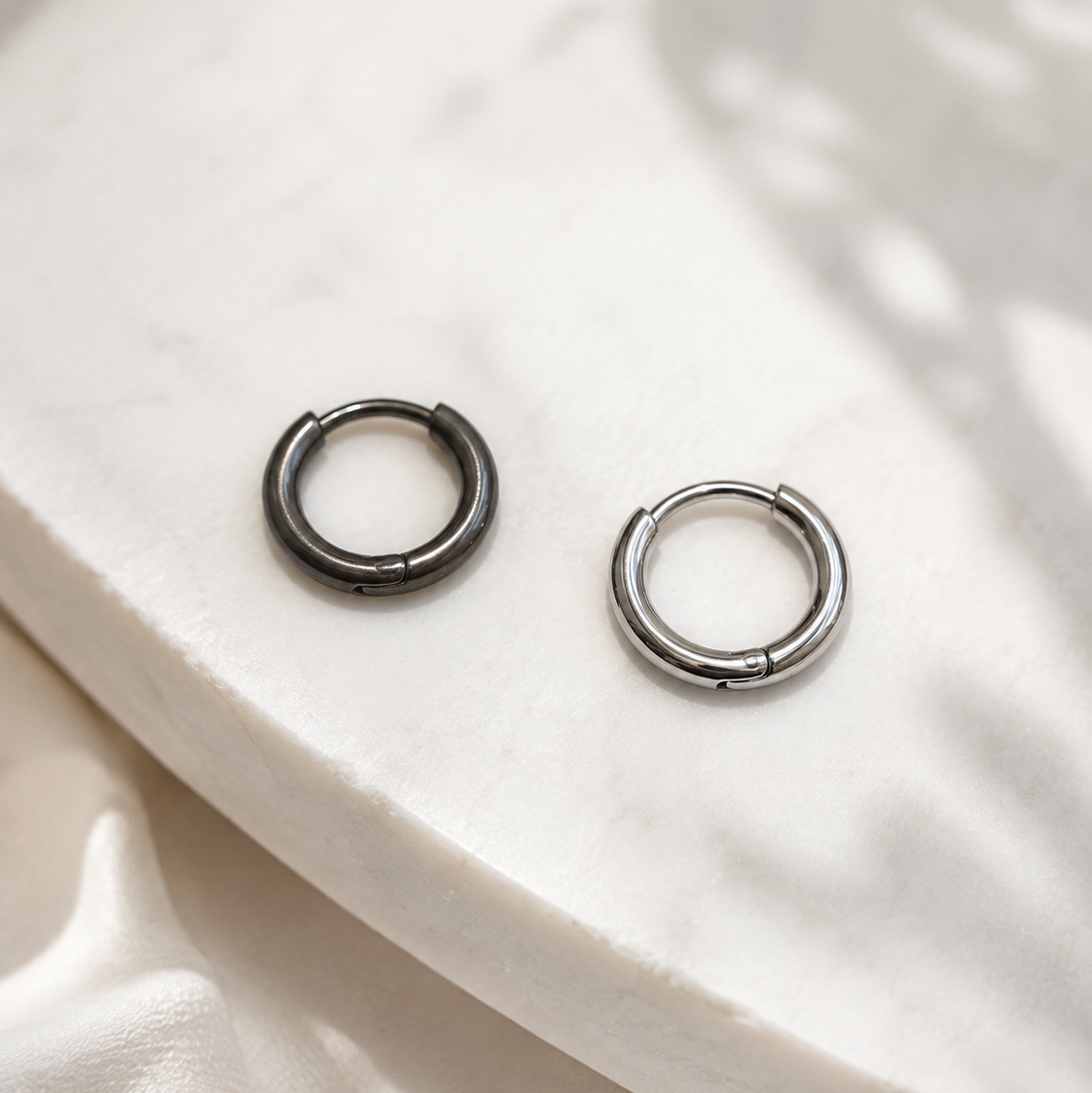 Why Our Titanium Earrings Are Bright Silver — Not Dark Grey