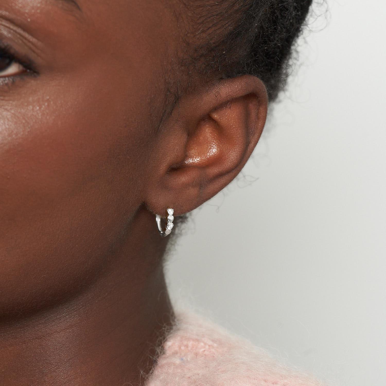 CZ Heart Huggie Hoops In Silver