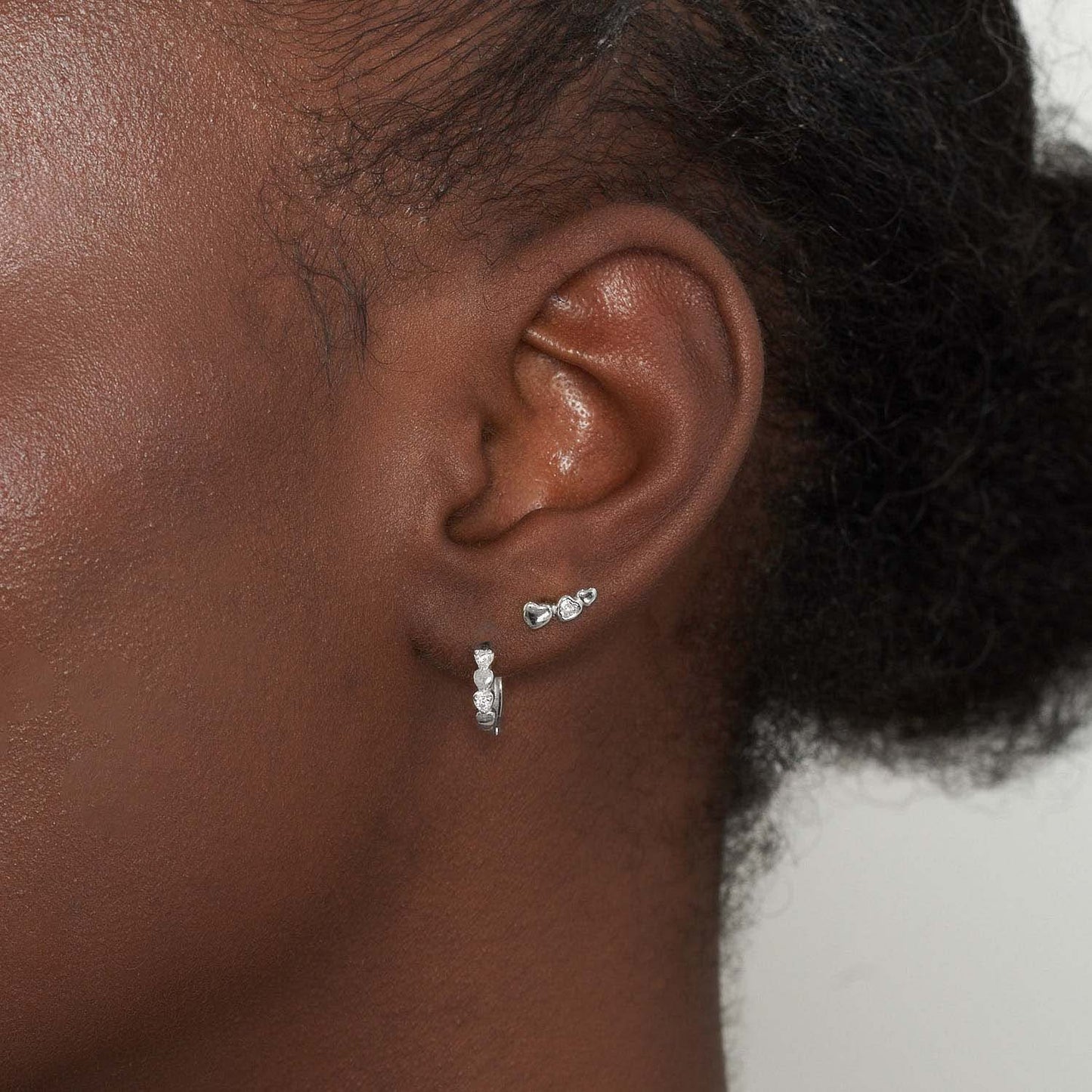 CZ Heart Huggie Hoops In Silver