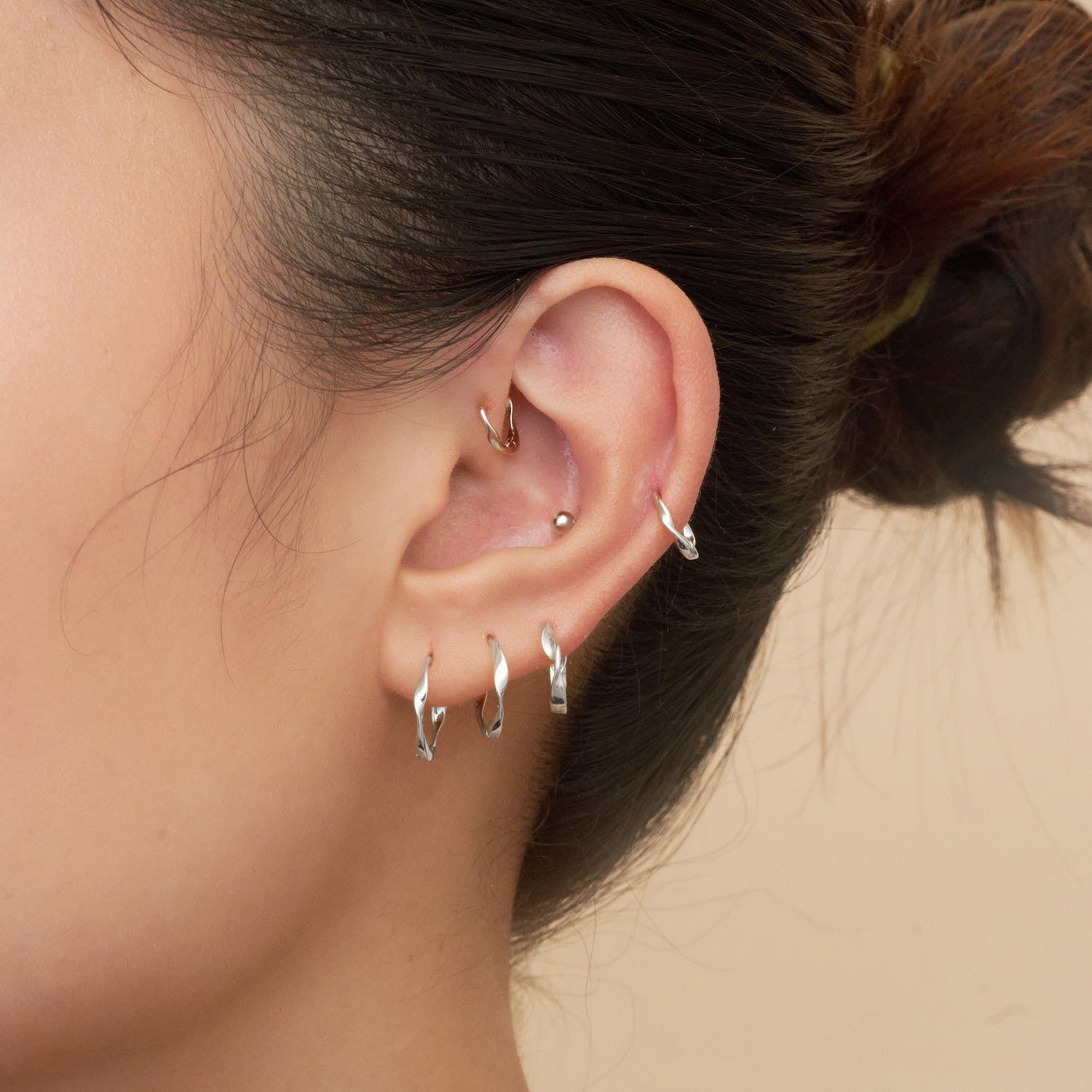 Twisted Huggie Hoops In Silver