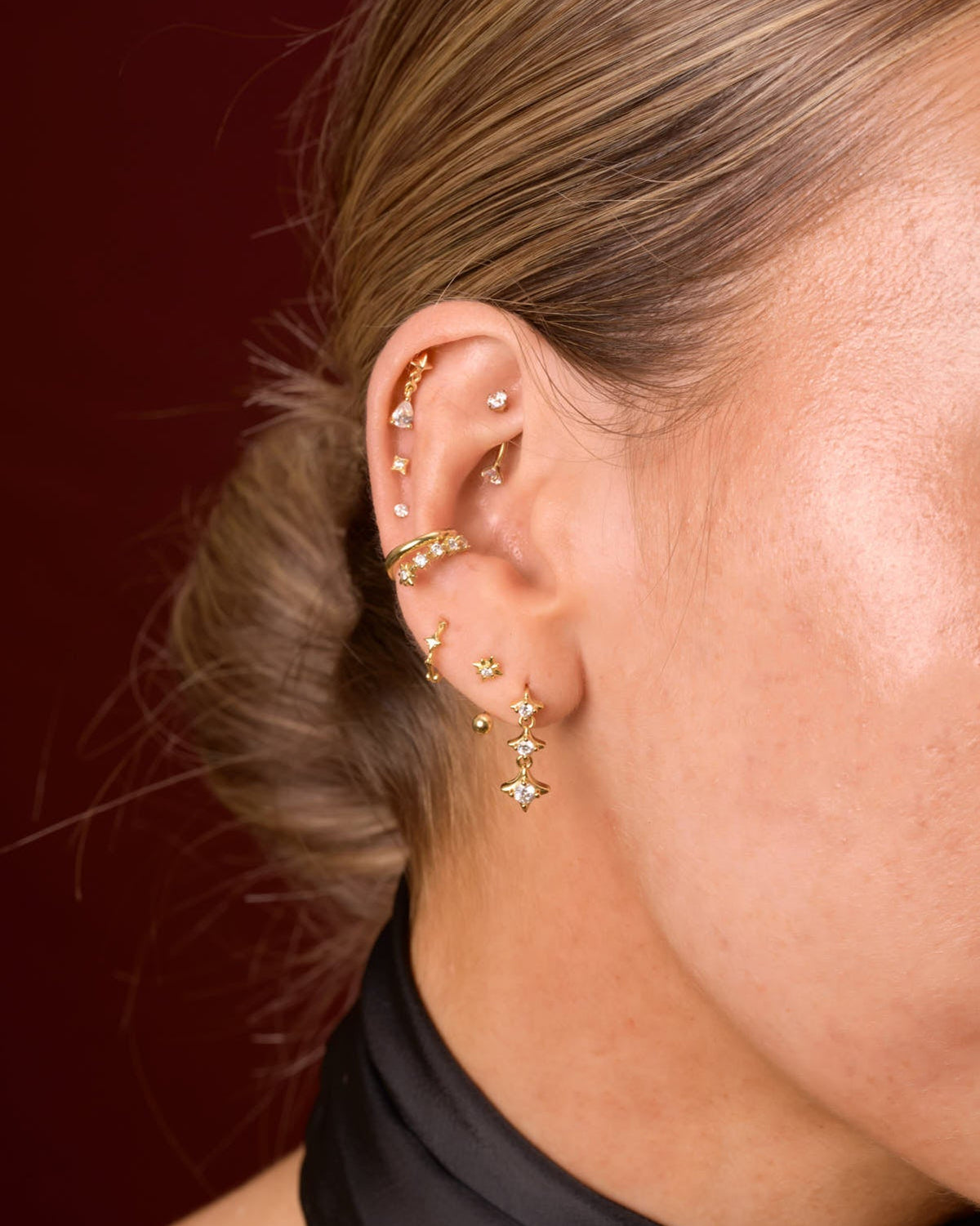 Triple Star Crystal Dangle Earrings In Gold