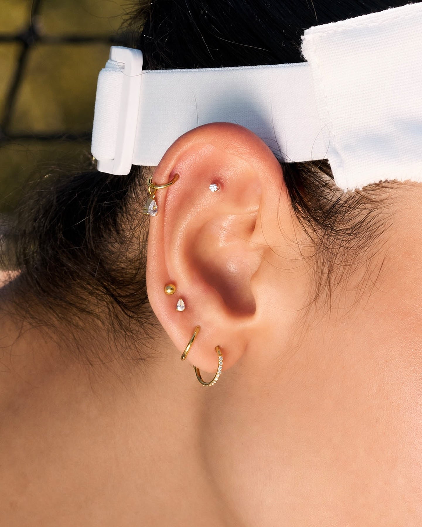 Titanium Teardrop Helix Clicker Huggie In Gold