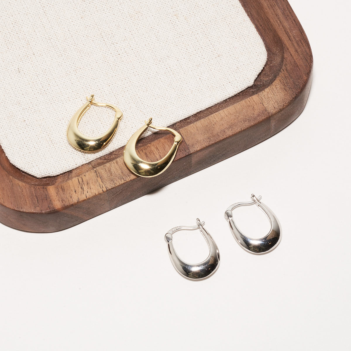 Crescent Hoop Earrings in Gold