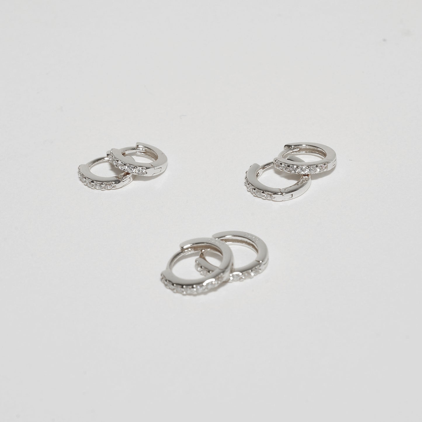 Crystal Paved Huggies Set in Silver