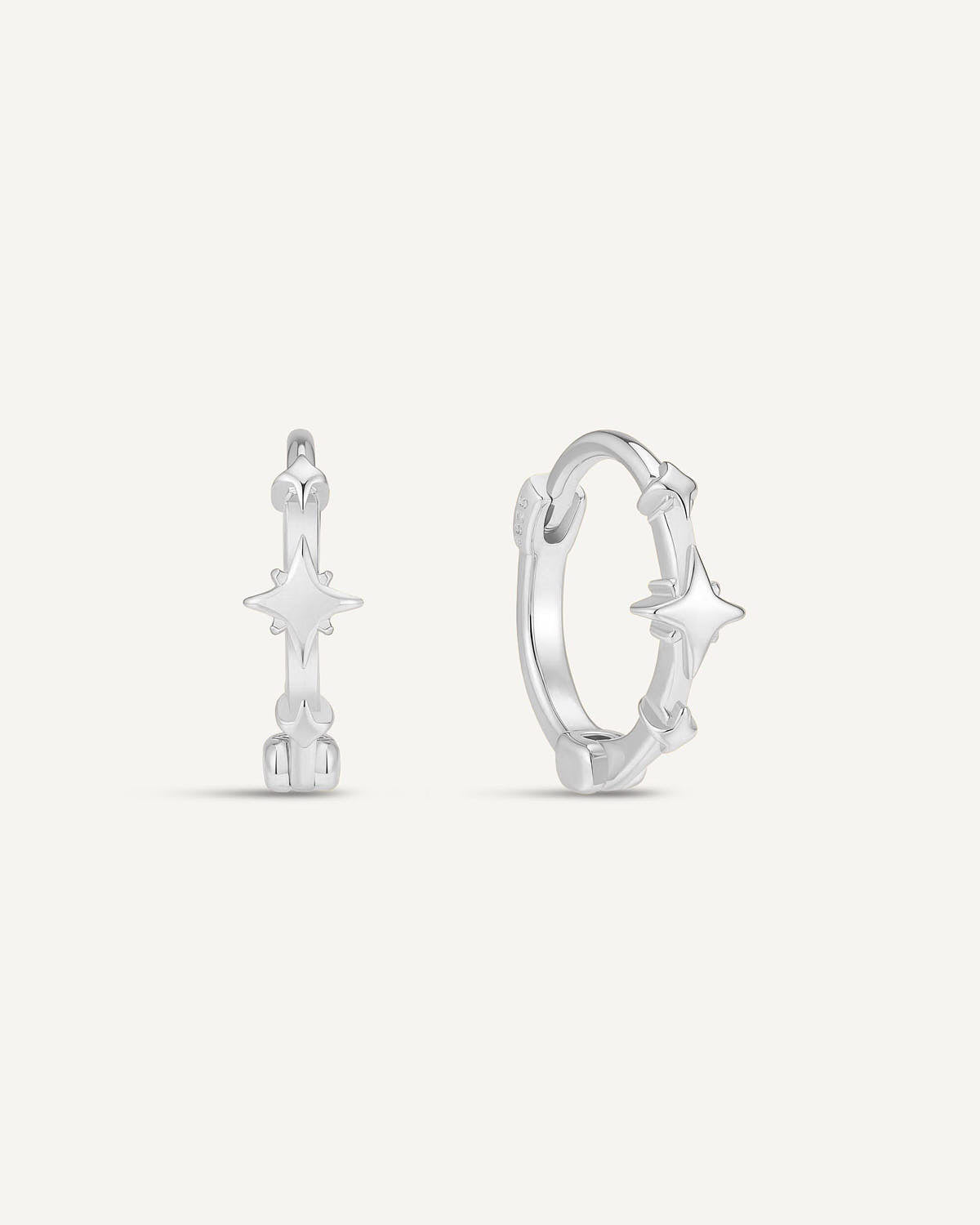 Raised Star Huggie Hoops In Silver