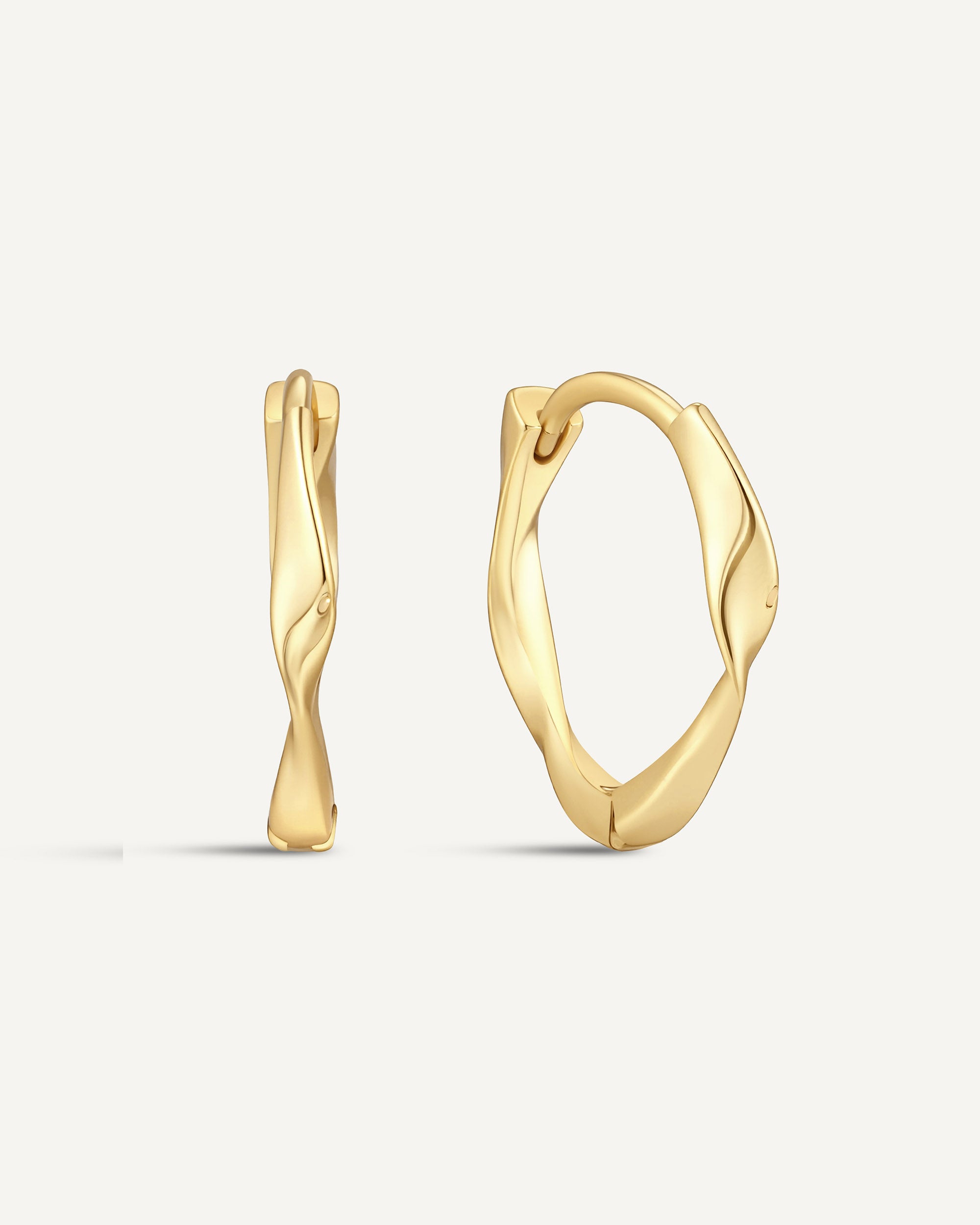 Twisted Huggie Hoops In Gold