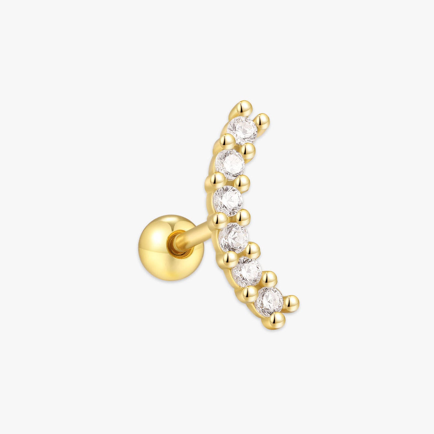 Gold earring with clear gemstones on a white background