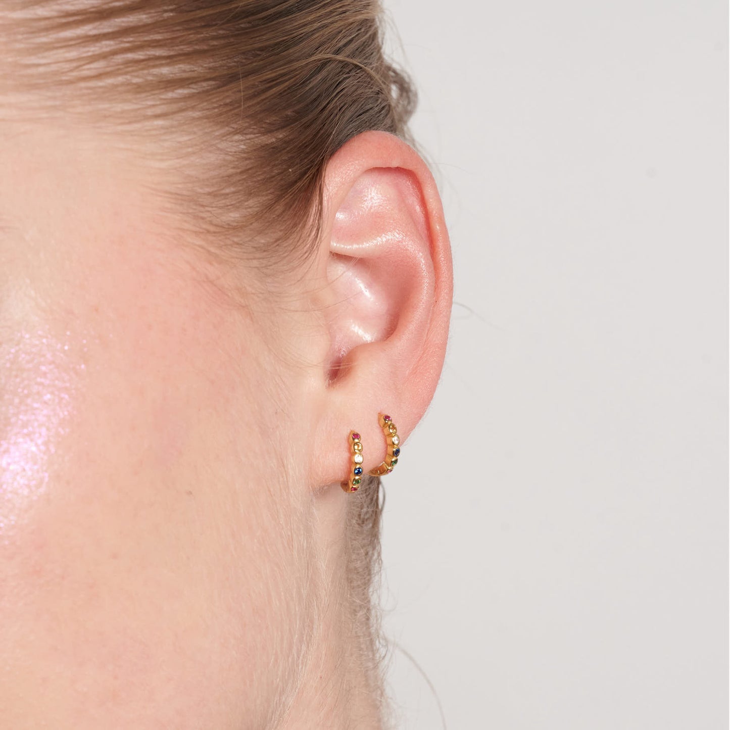 Rainbow Bezel Huggies In Gold