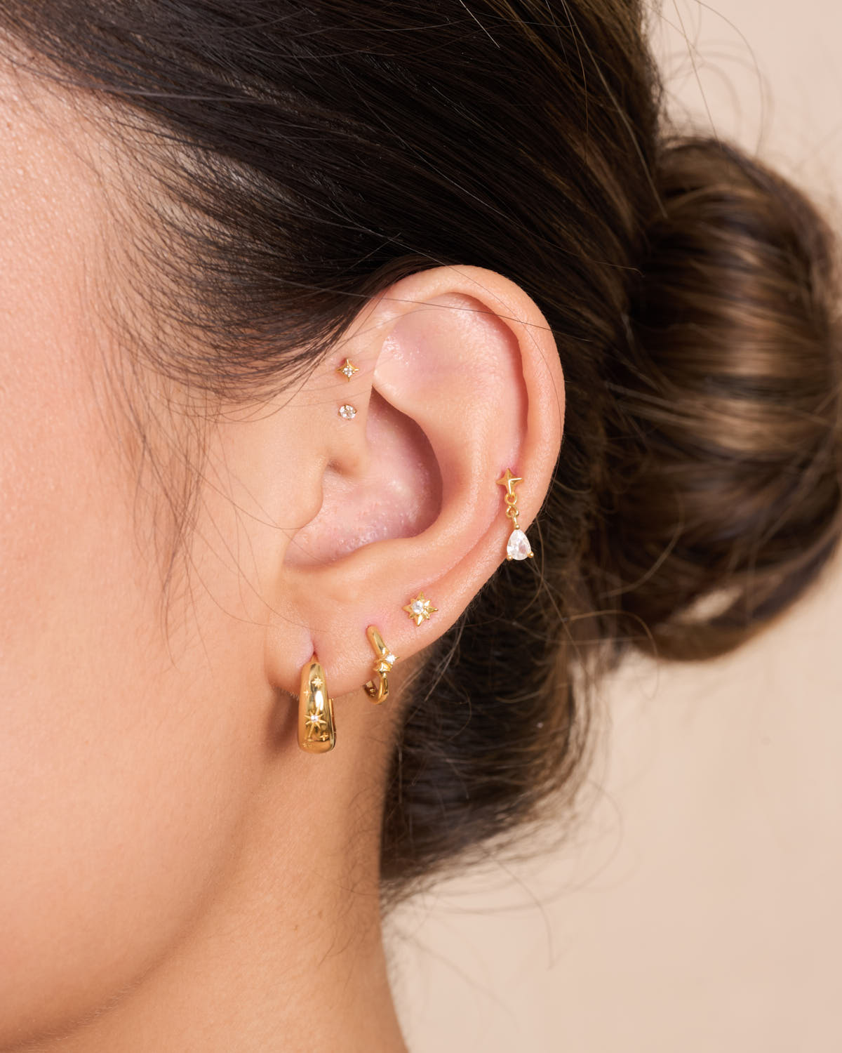 Double Star Crystal Huggie Hoops In Gold