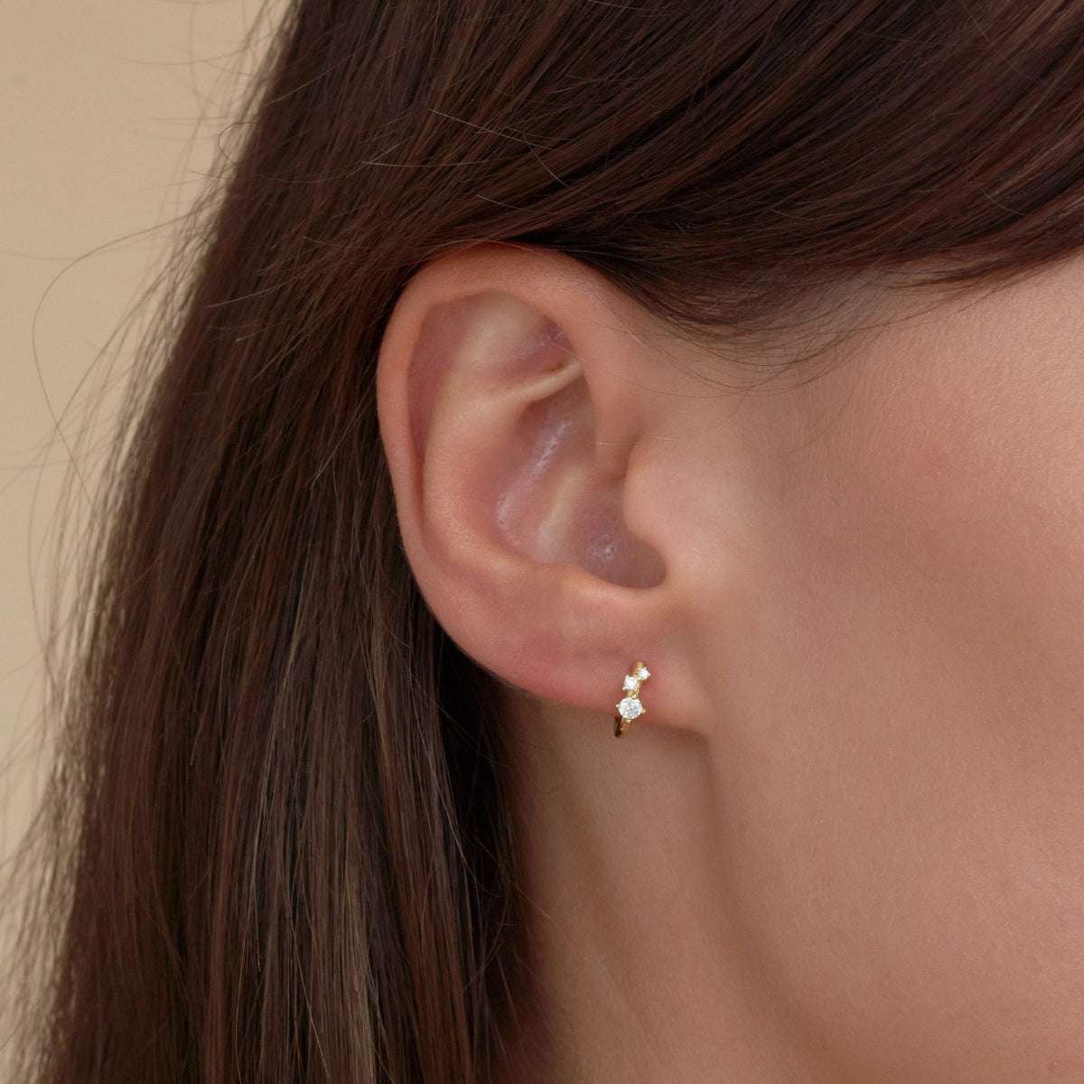Sprinkle Crystal Huggie Hoops In Gold - LÉA