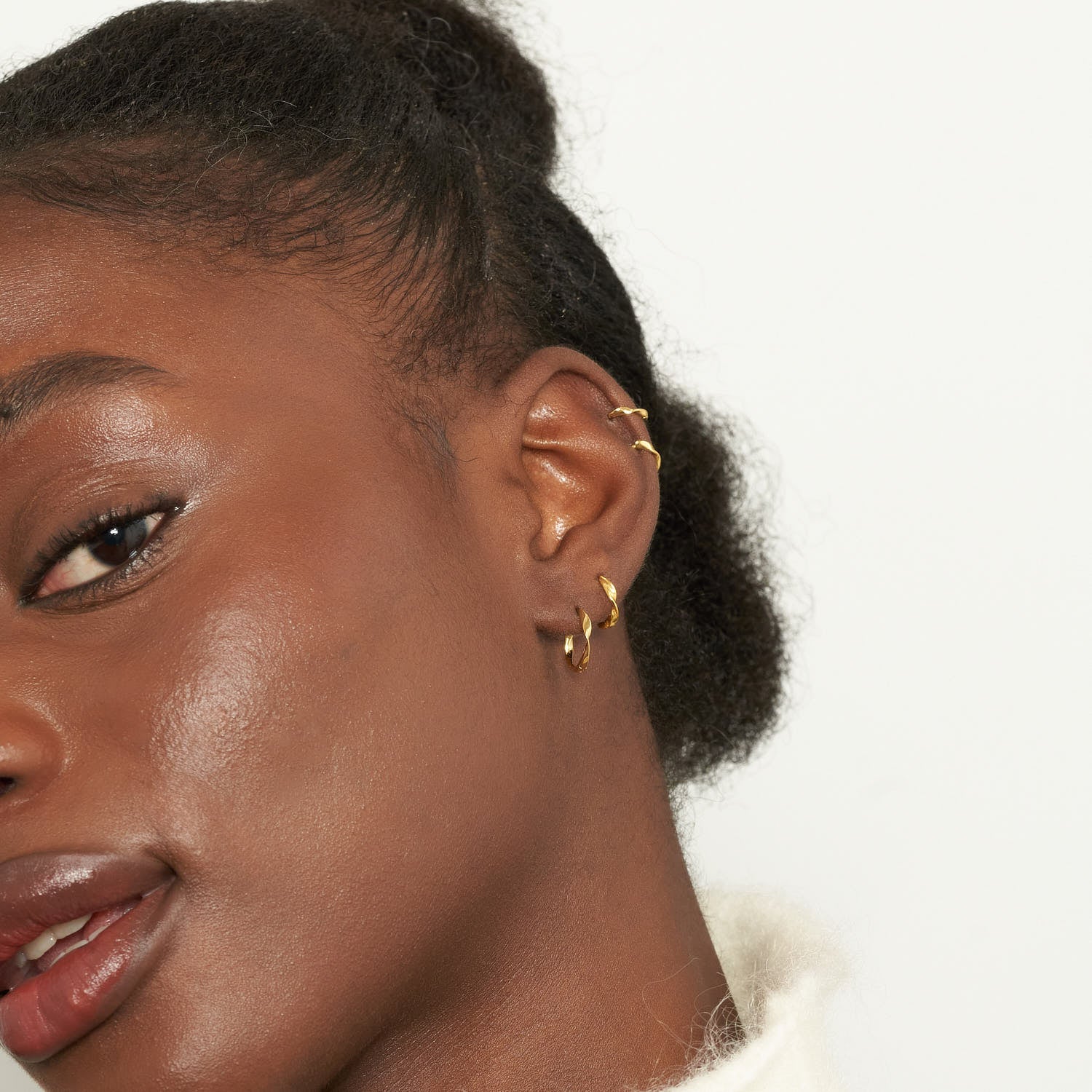 Twisted Huggie Hoops In Gold