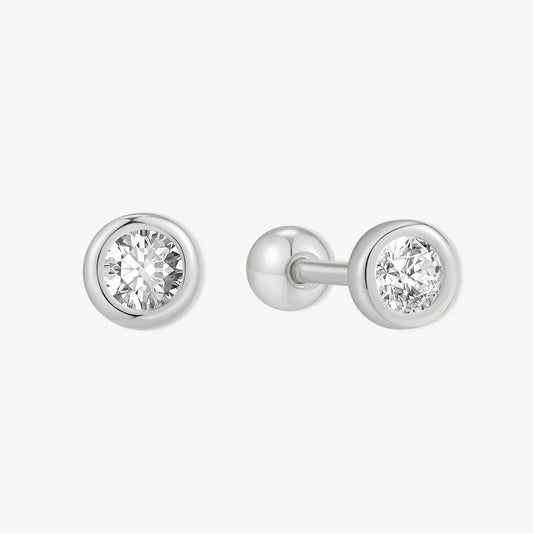 Pair of silver stud earrings with clear gemstones on a white background