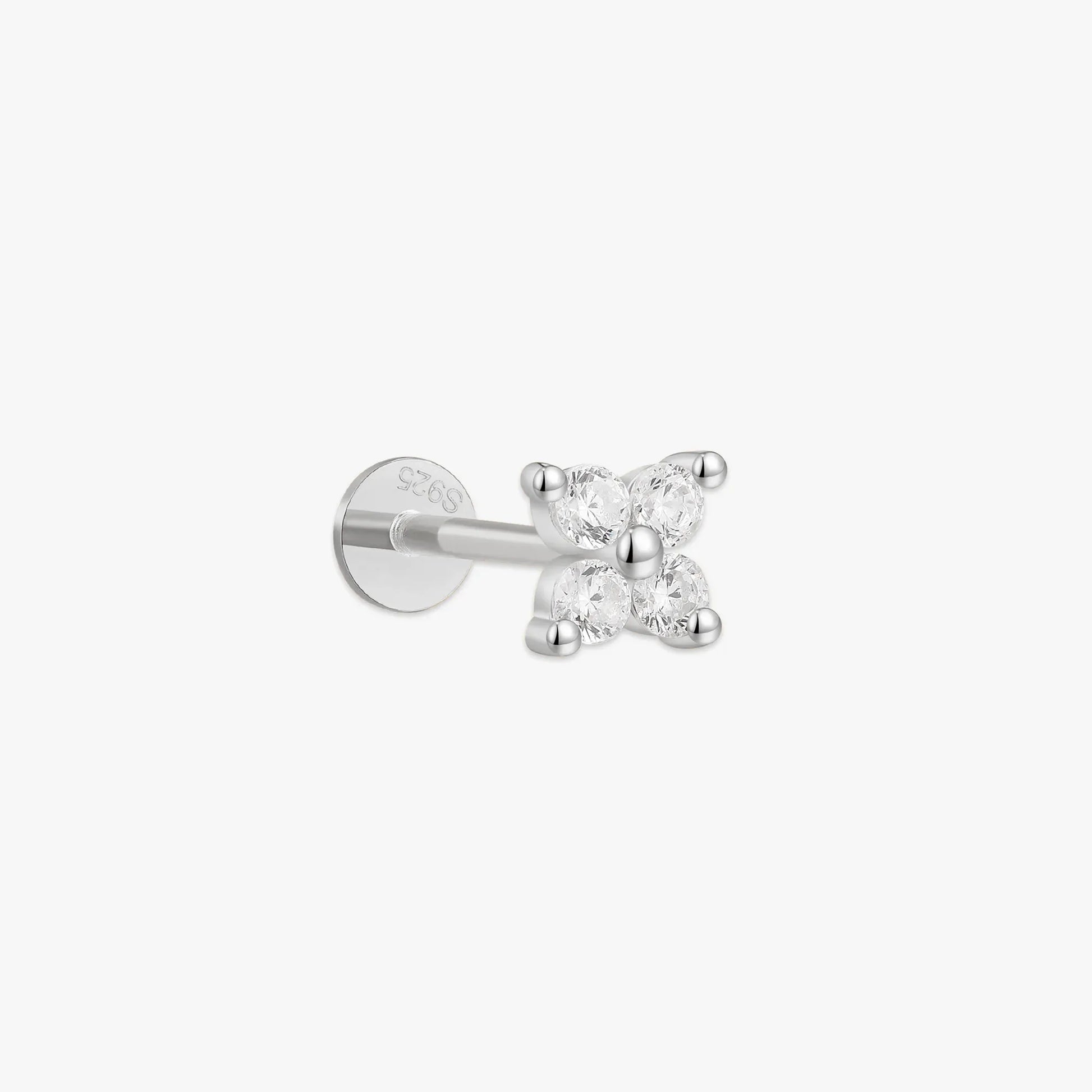 Single stud earring with a clear gemstone on a white background