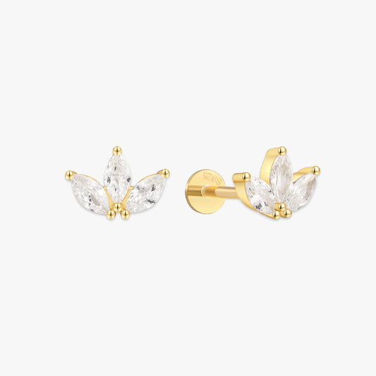 Gold and clear crystal earrings on a white background