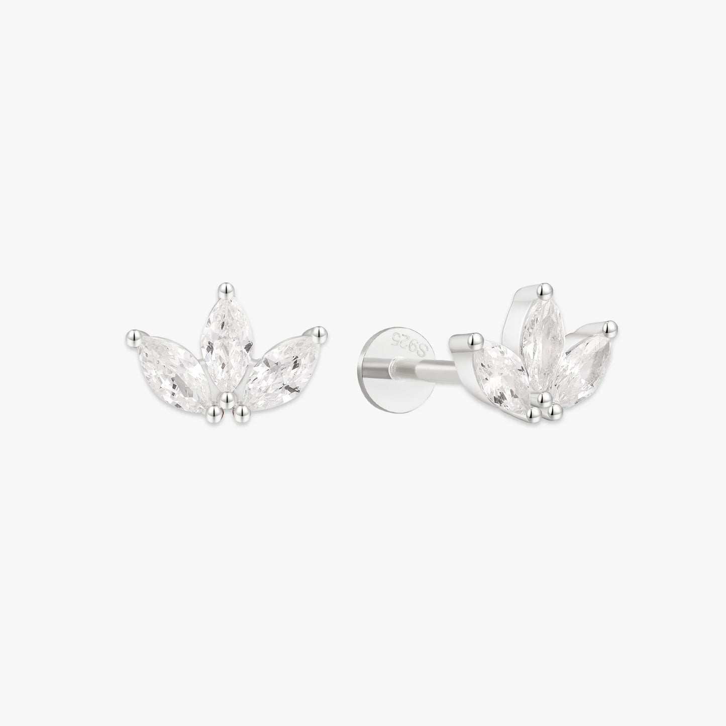 Pair of silver earrings with clear gemstones on a white background