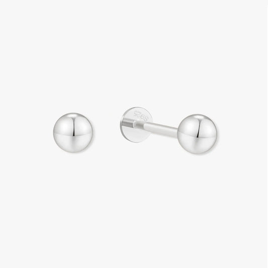 Pair of silver stud earrings on a white background
