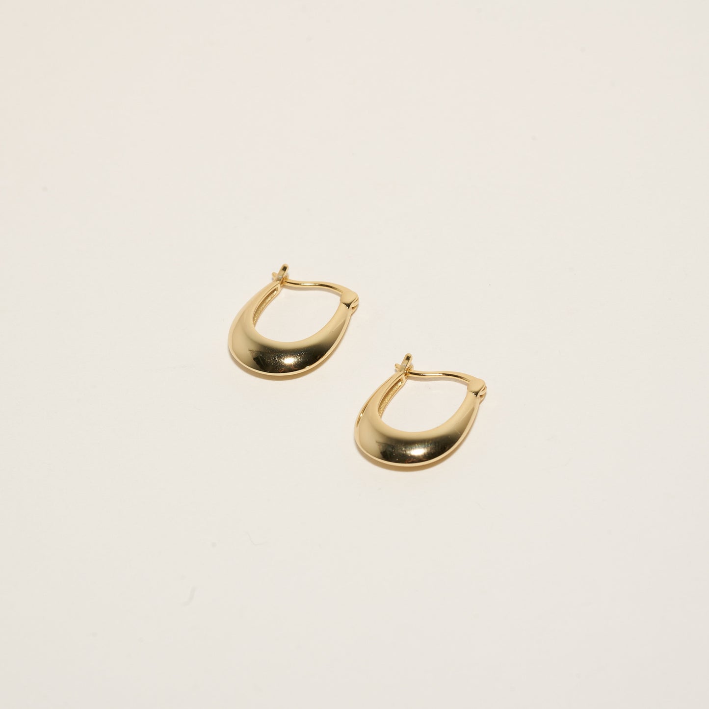 Crescent Hoop Earrings in Gold