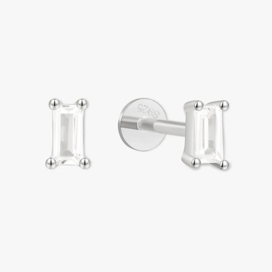 Silver stud earrings with baguette-cut gemstones on a white background