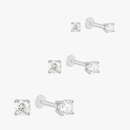 Set of diamond stud earrings on a white background