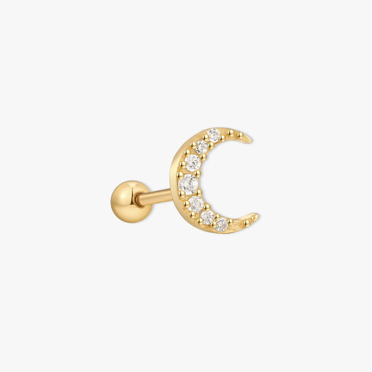 Gold moon-shaped earring with embedded diamonds on a white background