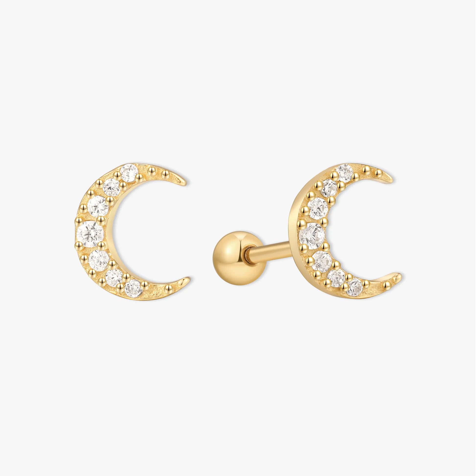 Gold moon-shaped earrings with diamond accents on a white background