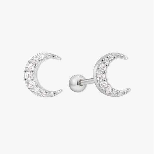 Silver crescent moon earrings on a white background
