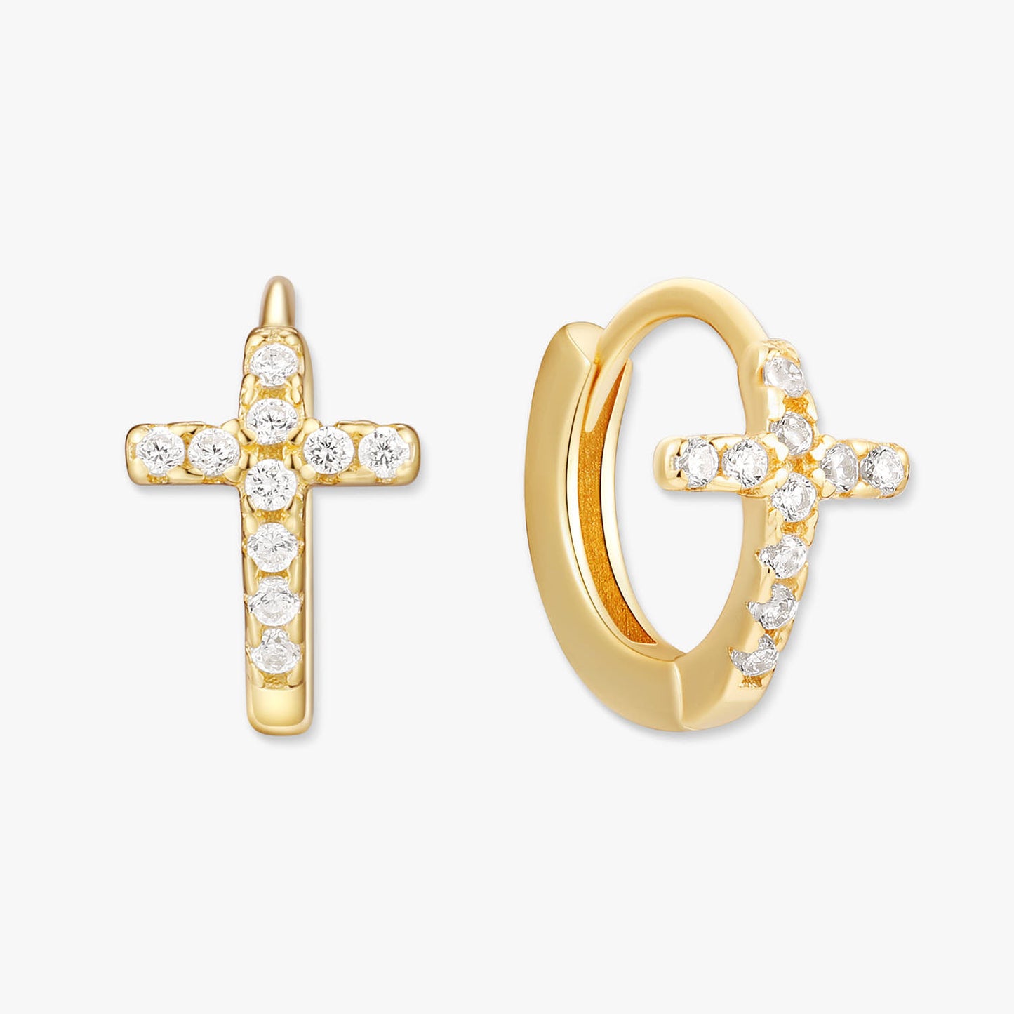 Gold cross-shaped earrings on a white background