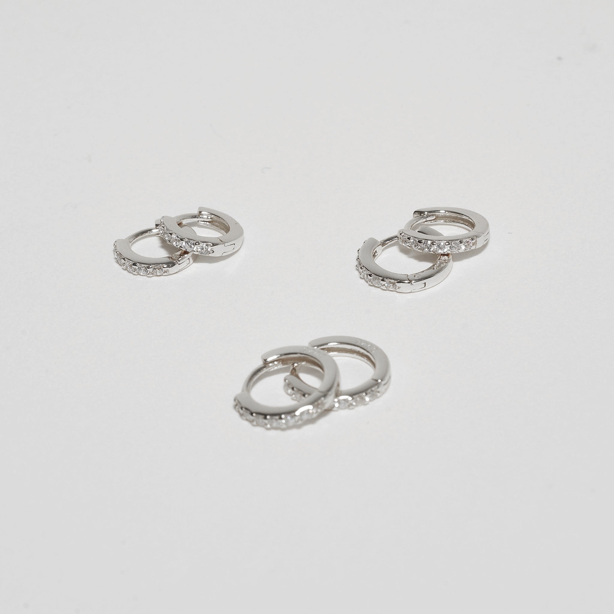 Crystal Paved Huggies Set in Silver