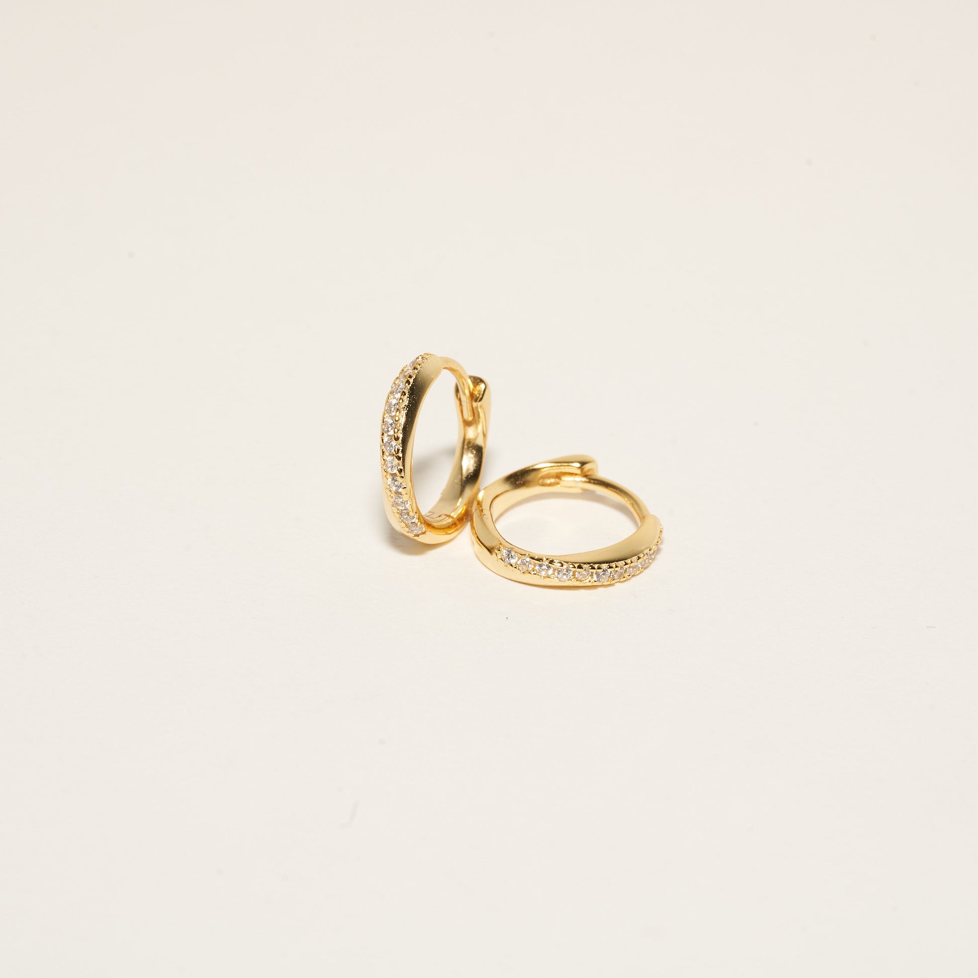 Crystal Paved Twisted Huggies in Gold