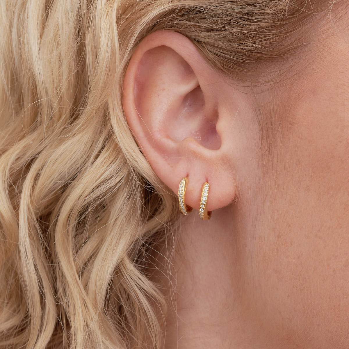 Crystal Paved Twisted Huggies in Gold