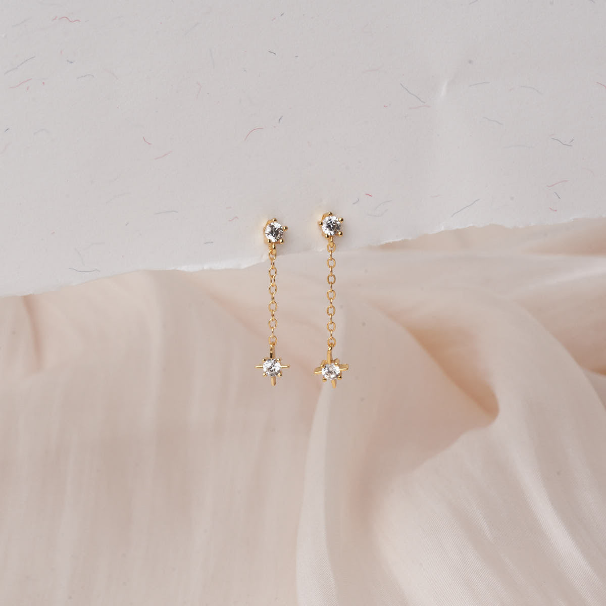 Crystal Star Chain Dangle Earrings in Gold
