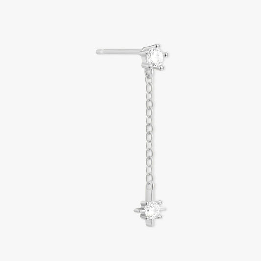Silver earring with a chain and star-shaped design on a white background