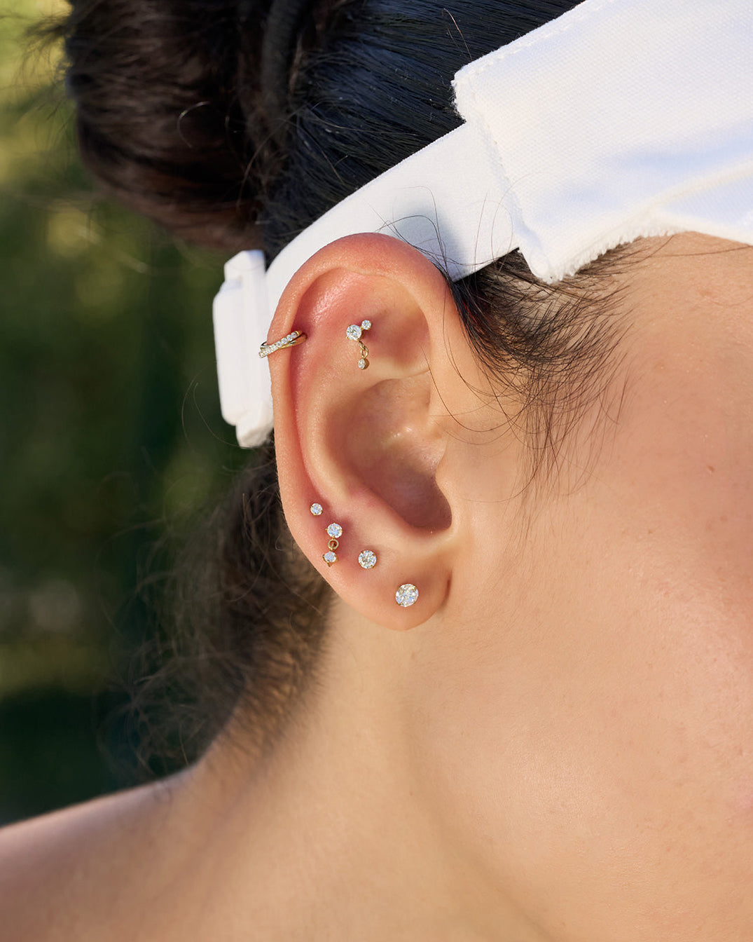 Titanium CZ Crossover Paved Helix Clicker In Gold