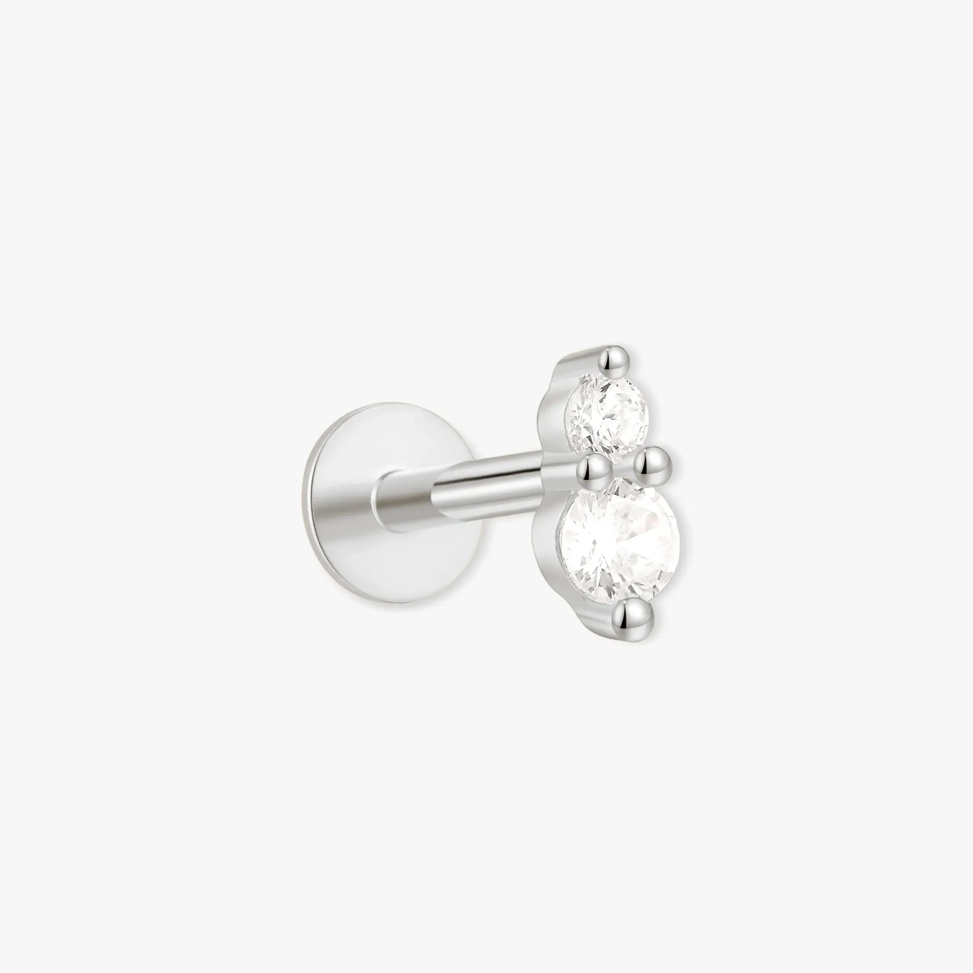 Single stud earring with clear gemstone on a white background