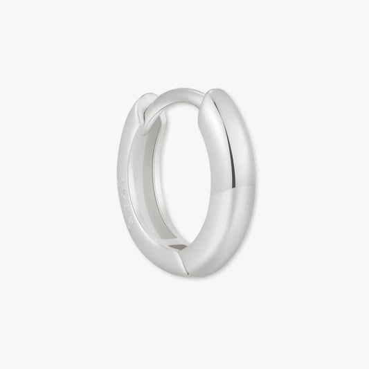 Silver hoop earring on a white background