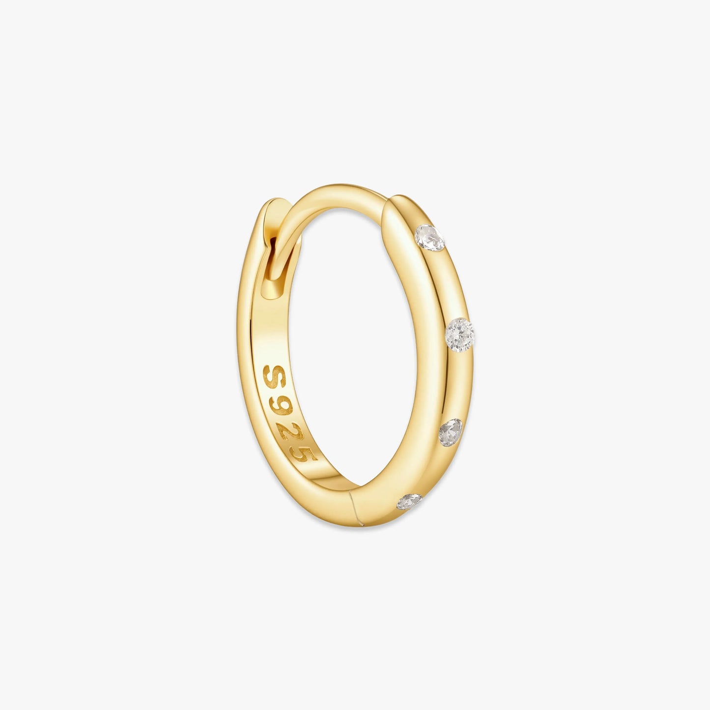 Gold hoop earring with small diamonds on a white background
