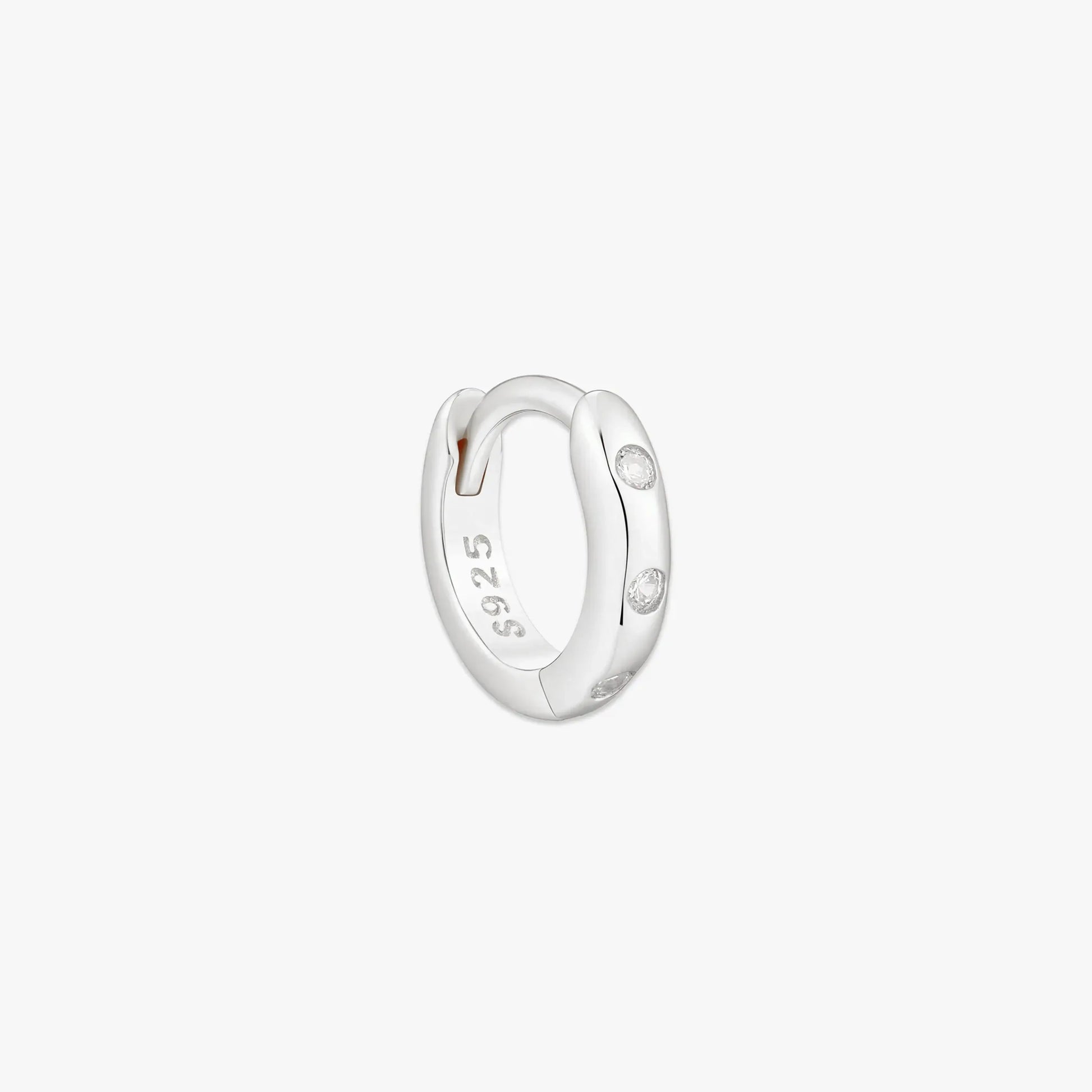 Silver hoop earring with '925' stamp on a white background