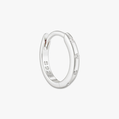 Silver hoop earring with 'S925' marking on a white background