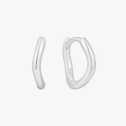 Silver hoop earrings on a white background