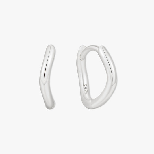 Silver hoop earrings on a white background