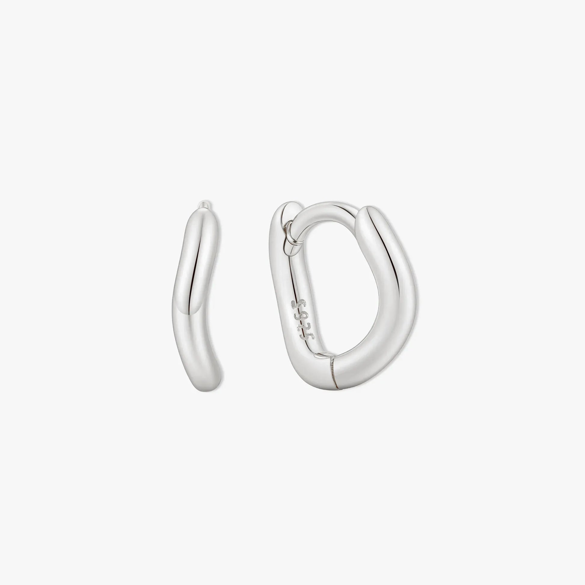 Pair of silver hoop earrings on a white background