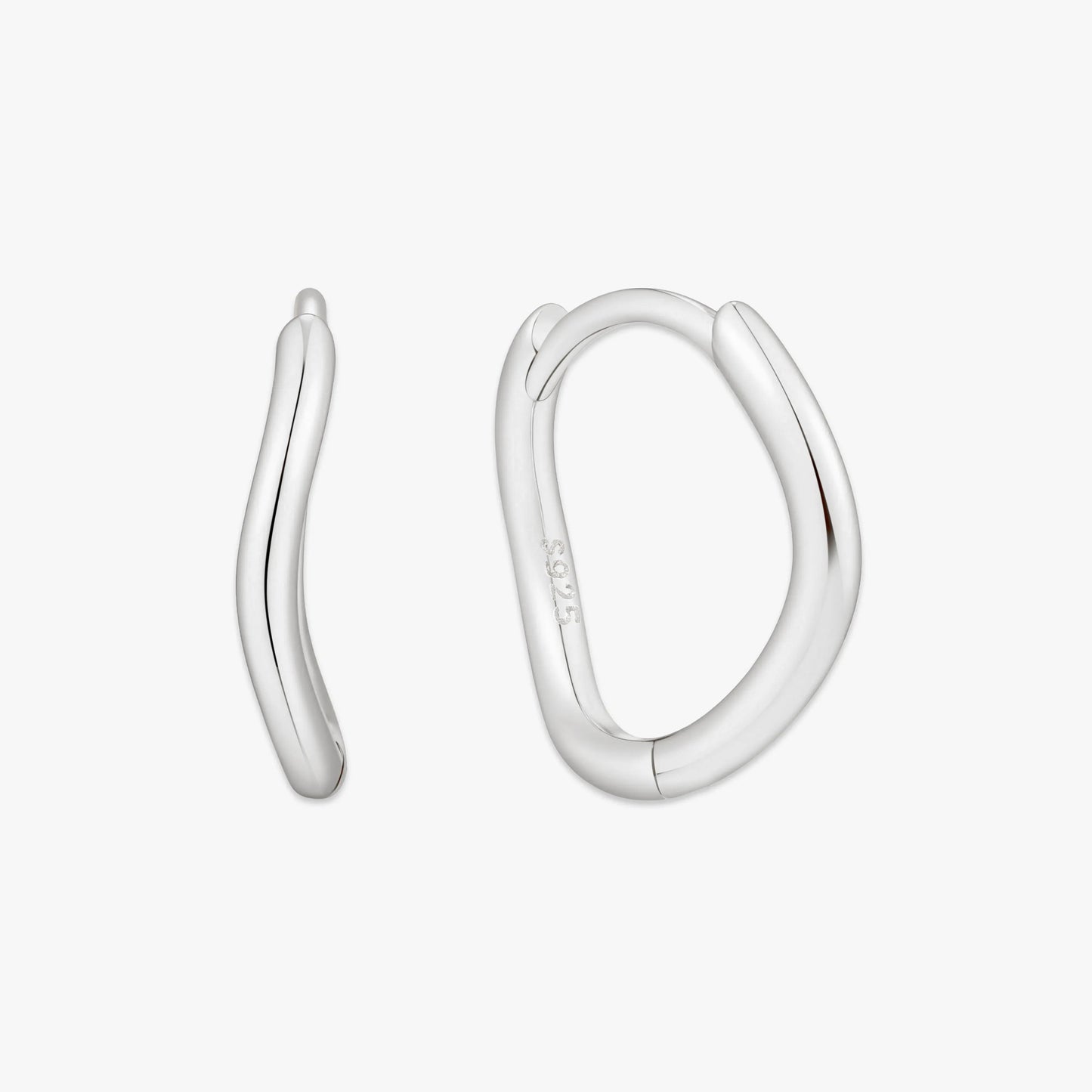 Silver hoop earrings on a white background