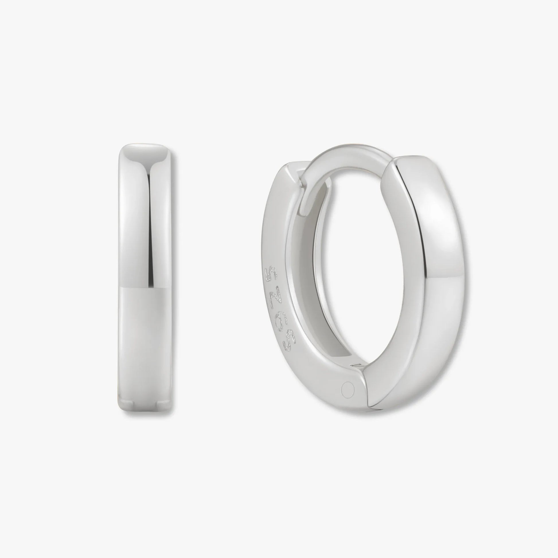 Silver hoop earrings on a white background