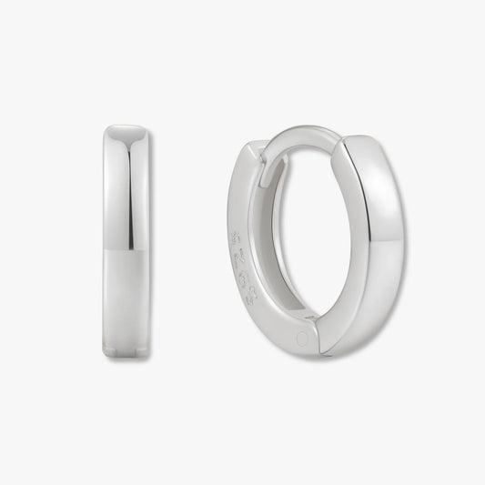 Silver hoop earrings on a white background