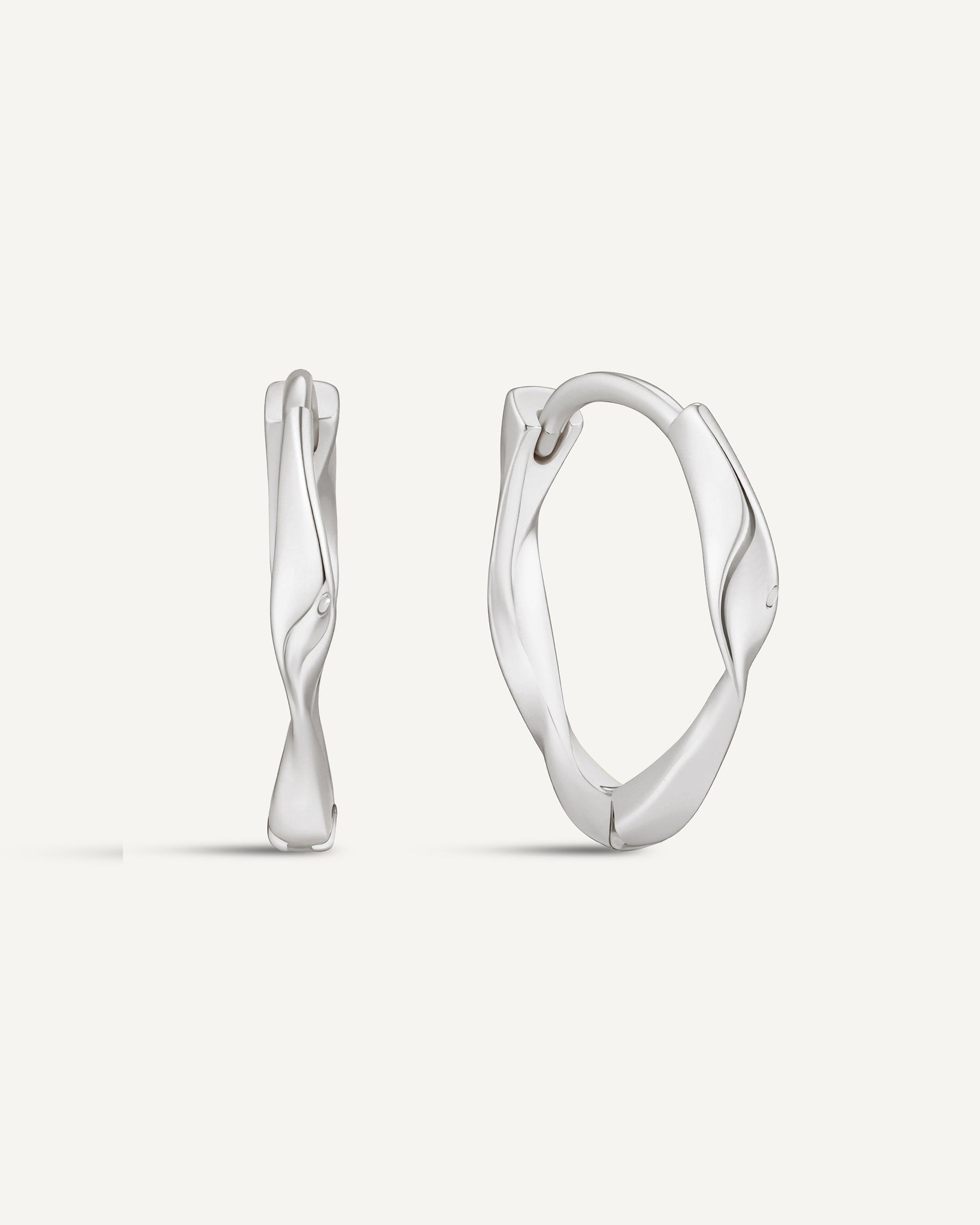 Twisted Huggie Hoops In Silver