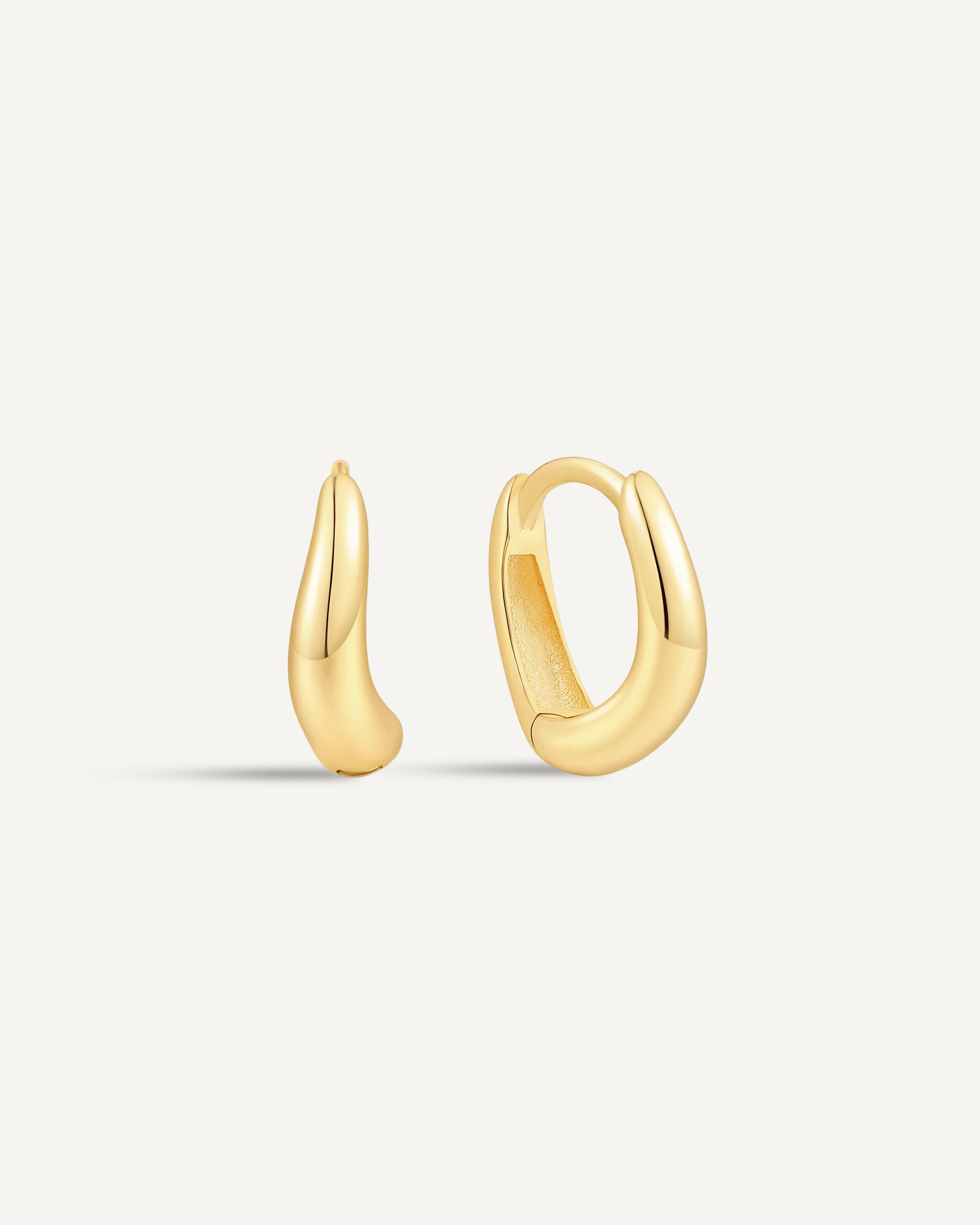 Tapered Wavy Huggie Hoops In Gold