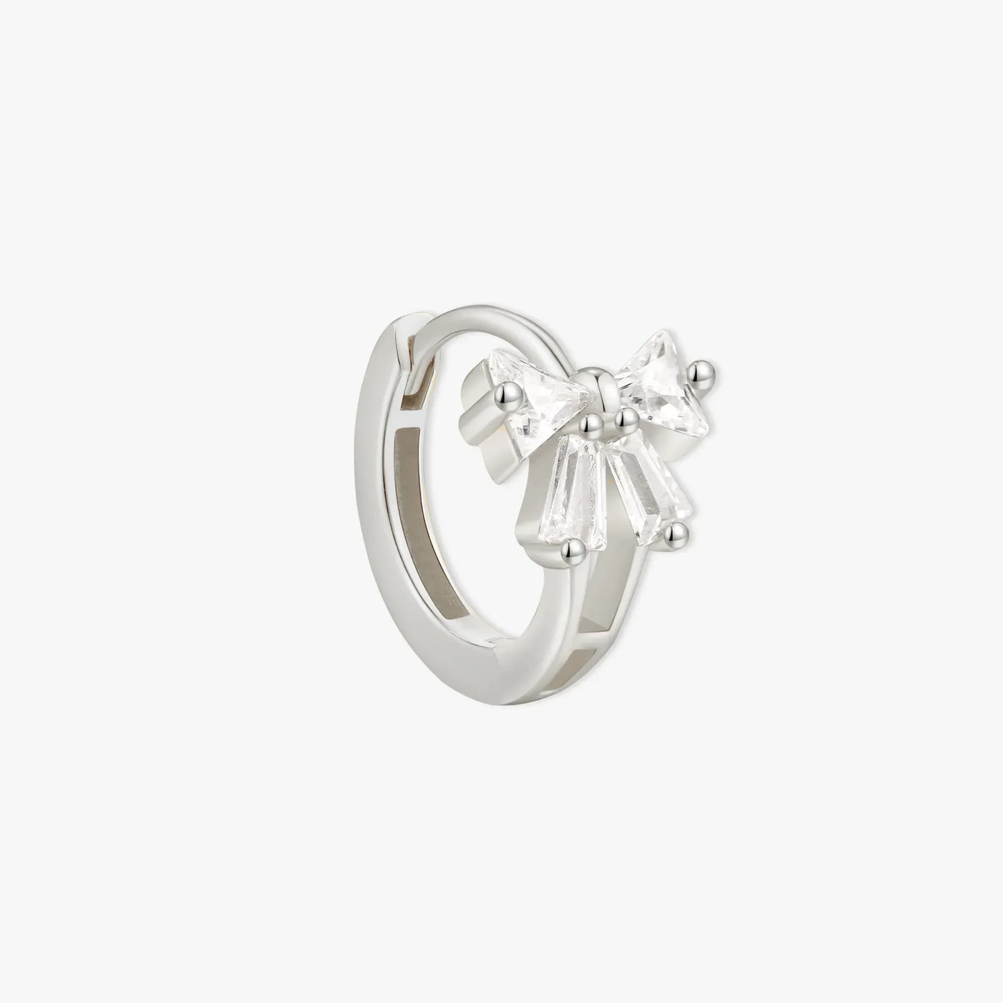 Crystal Bow Huggie Hoops In Silver