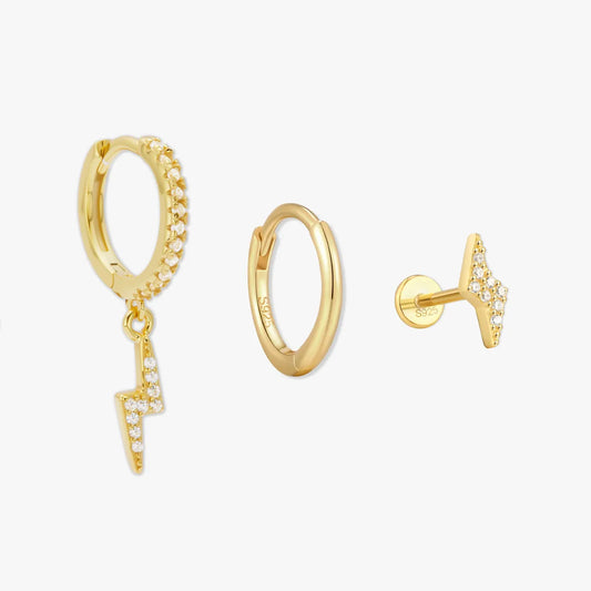 Gold hoop earrings with small diamond accents on a white background