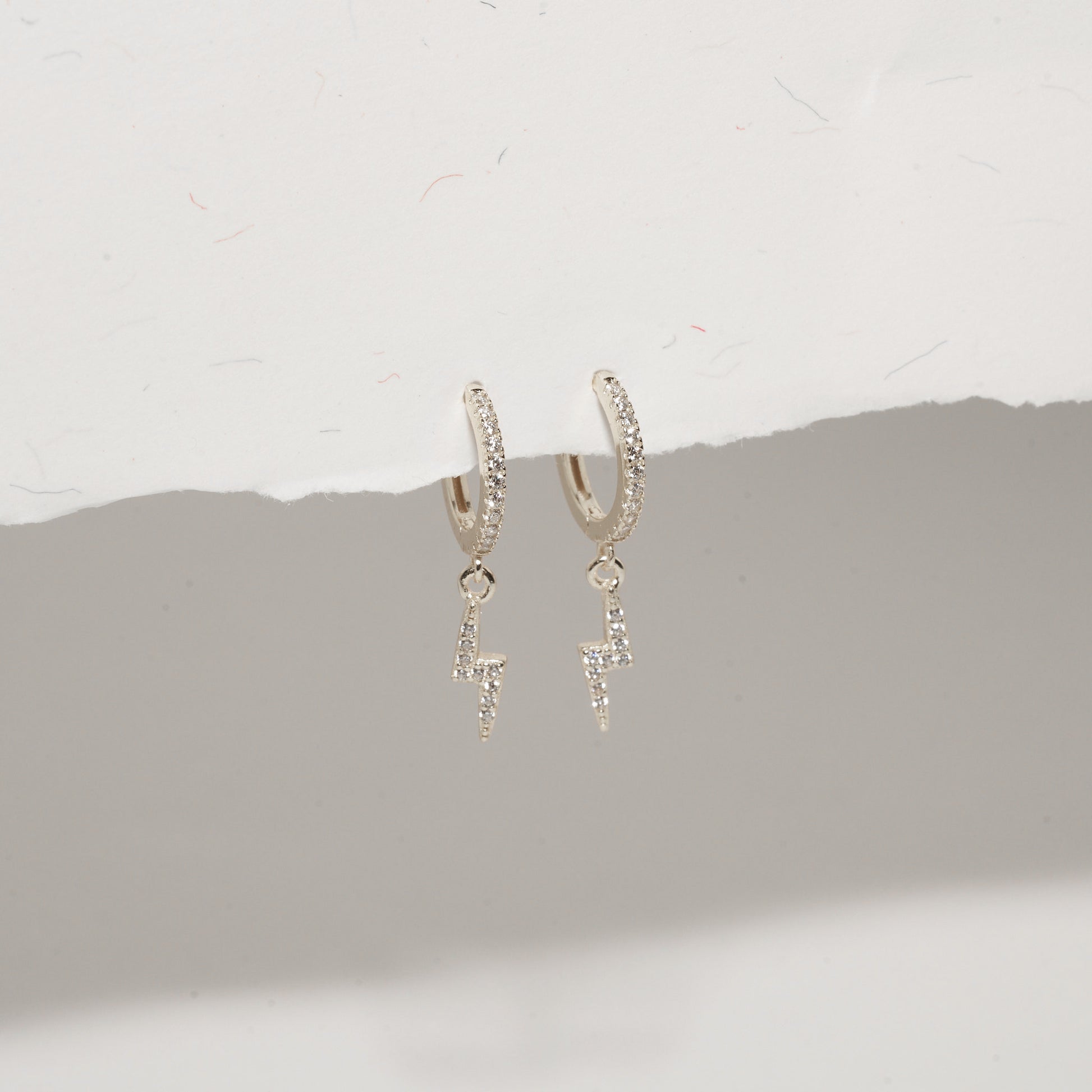 Lightning Bolt Dangle Hoops In Silver