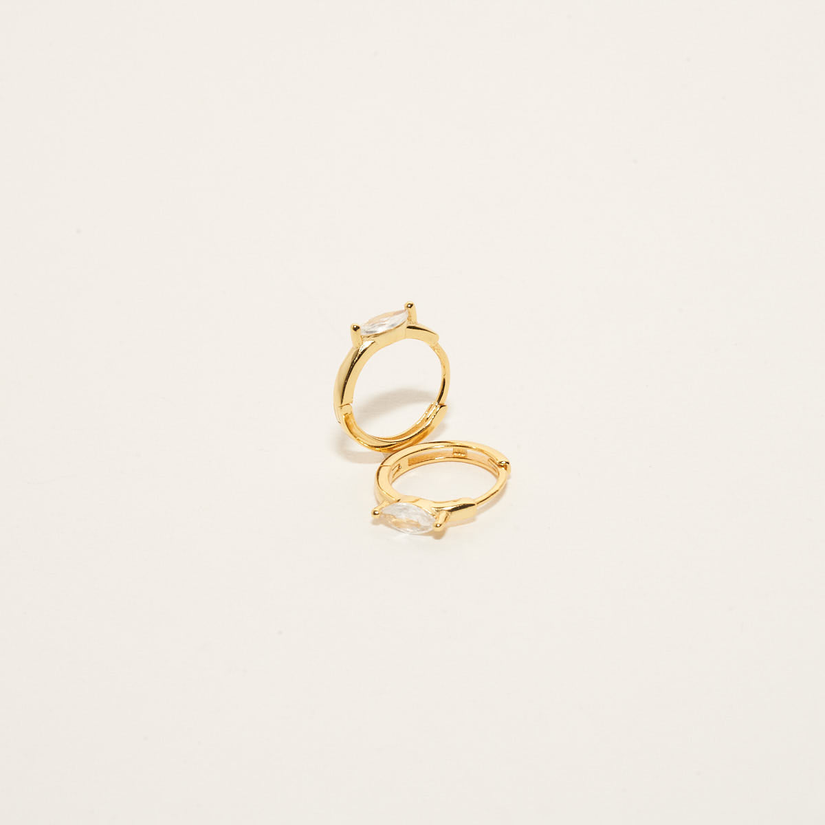 Marquise Crystal Huggie Hoops In Gold
